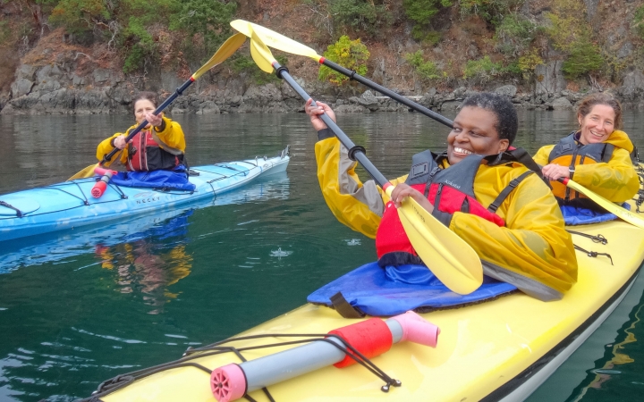 adults unplug on sea kayaking trip